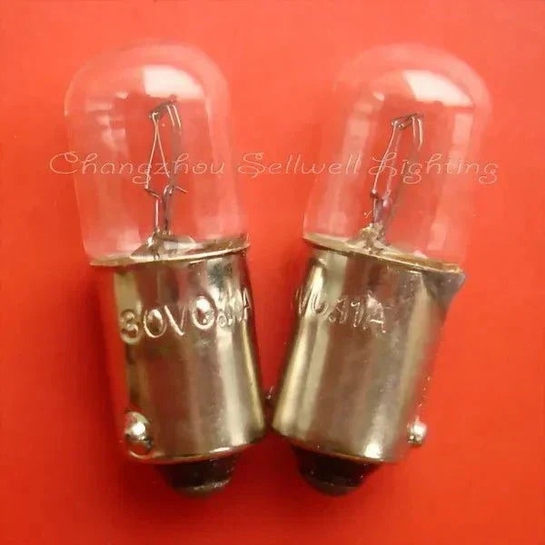 Two miniature lights 30V 0.11A BA9S T10x28 bulbs on red background