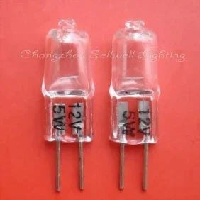 Two clear 12V 5W G4 halogen bulbs on red background