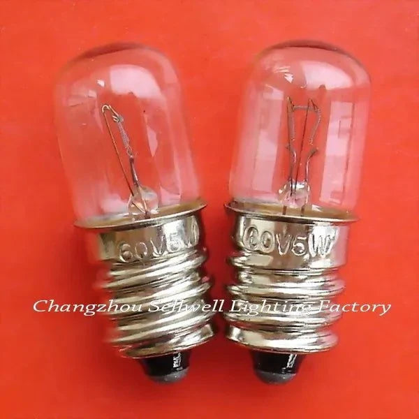 Two miniature 60V 5W E12 base lamps with clear glass bulbs on red background