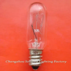 Miniature 220V 15W E12 base clear miniature lamp on orange background