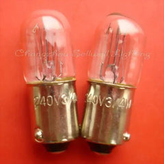 Two miniature lamps 240v 3/4w ba9s base on red background