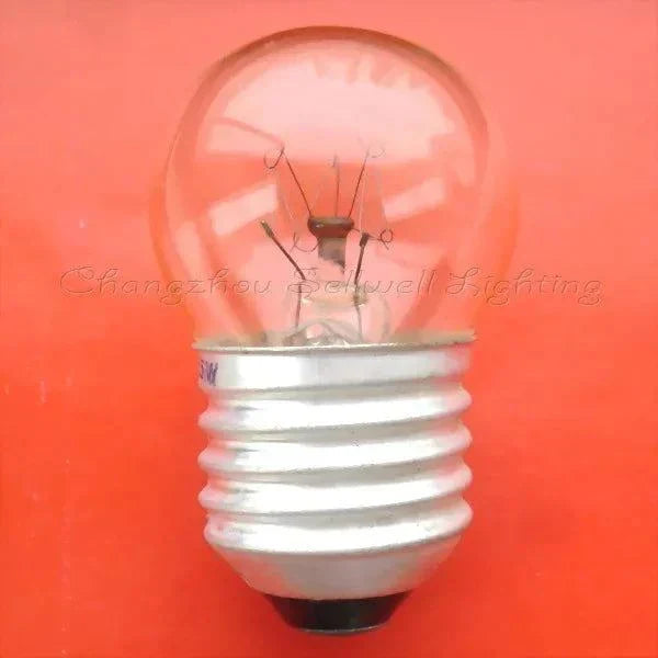 Miniature bulb 120v 15w E26 base clear glass light bulb on orange background