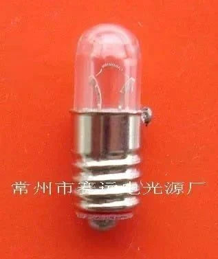 Miniature 2.4V 0.5A electric light source bulb with E5 x 15 base against red background