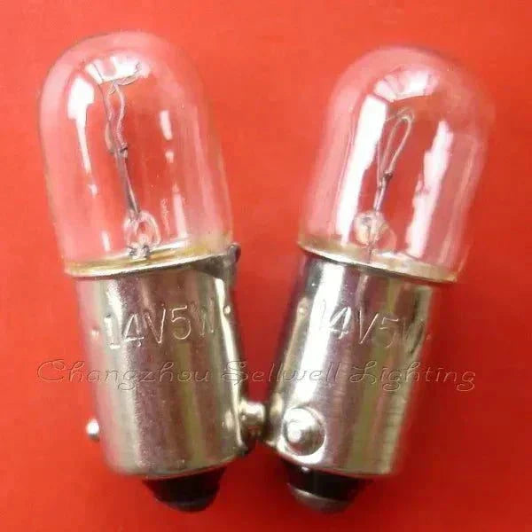 Pair of 14V 5W Ba9s miniature light bulbs with clear glass and metal base on red background