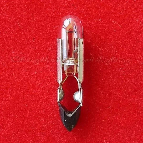 Miniature 24v 50mA T4.8x22mm lamp bulb on red background