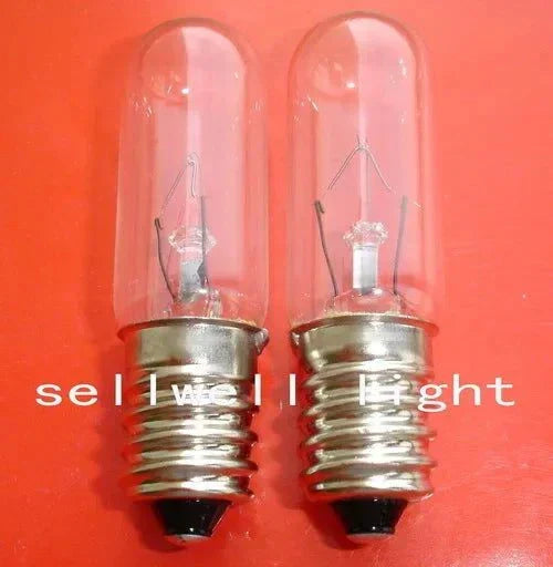 Two miniature lamps 24v 15w with E14 base on red background