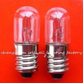 Miniature lamp 130V 2.6W E10 T10X28 C-5A two bulbs on red background