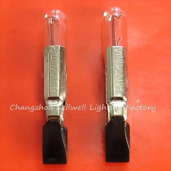 Two 60V 20mA 5x30mm telephone lamps with metal base and glass bulb on orange background