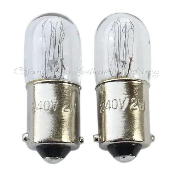 Two miniature 240v 2w ba9s t10x28 lamps with clear glass and metal base