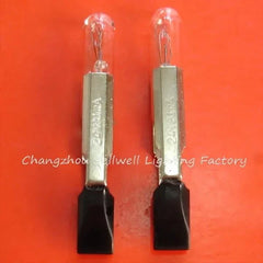 Two 24V telephone light bulbs with metal bases and clear glass tubes on an orange background