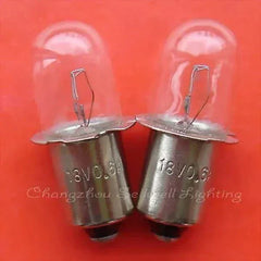 Close-up of two 18V 0.6A Krypton lamps with P13.5S base on red background