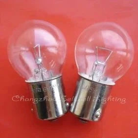 Miniature light 6V 15W BA15S G25 clear glass bulb with metal base set against red background