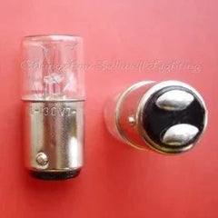 Miniature lamp 110-130V 7-10W BA15D bulb with dual contact base against red background