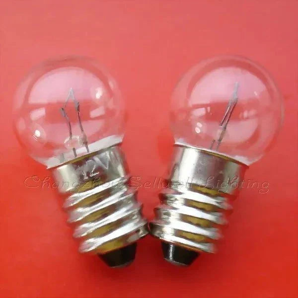 12V 0.3A miniature lamp with E10 base, pack of 10 bulbs on red background