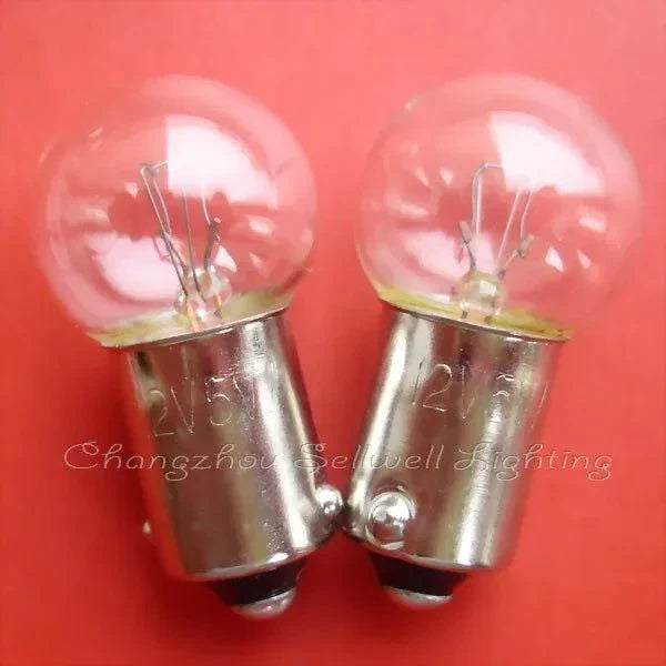 Two miniature 12v 5w ba9s g14 replacement light bulbs on red background