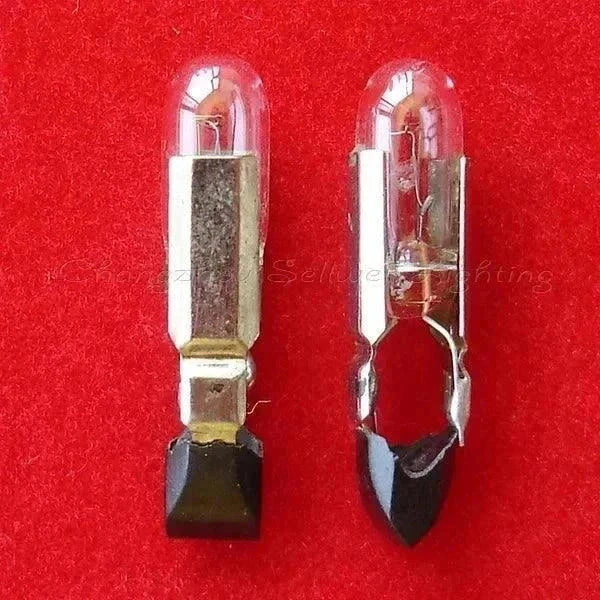 Miniature lamp 28V 50mA T4.8x22mm bulb with clear glass and metal base on red background