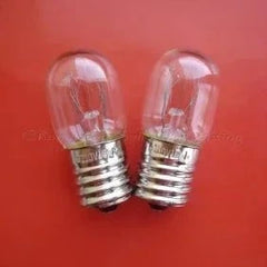 Two miniature 110V 15W E17 base lamps with clear glass bulbs on red background