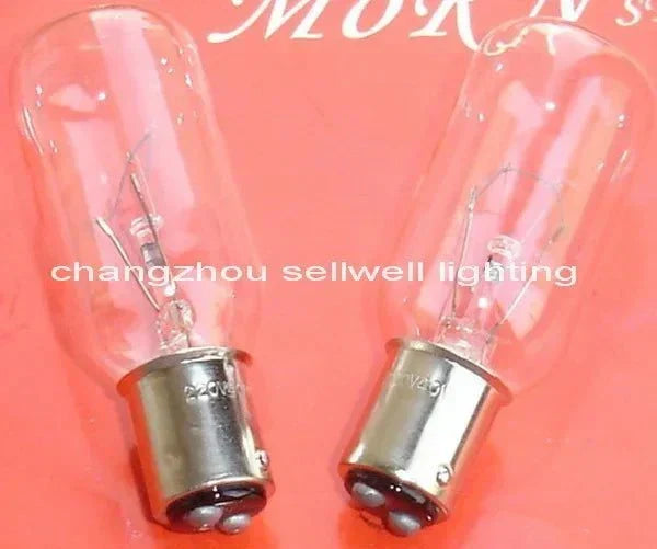 small lamp 220v 40w BA15D miniature bulb with metal base on red background