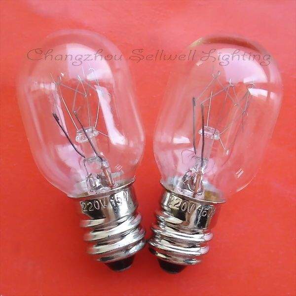 Two clear E12 screw base instrument indicator bulbs on red background with 220V 15W markings