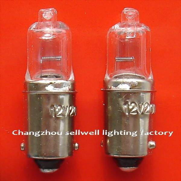 Two 12V 20W Ba9s lamp holders light bulbs on red background for teaching aids and signal instruments.
