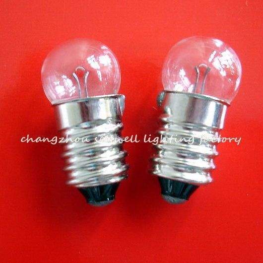 Set of two clear instruments bulb screw E10 lamp holders on red background