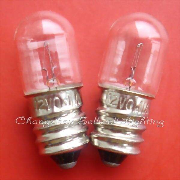 Two small clear E12 screw base indicator bulbs on red background for 12v lighting