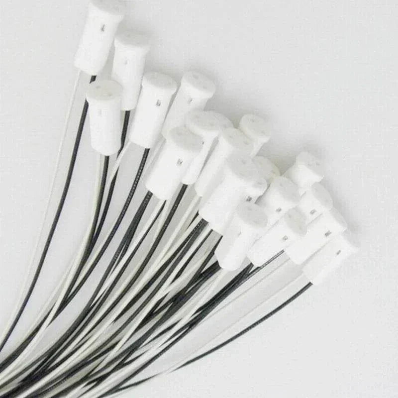 Bundle of white ceramic g4 lamp base sockets with black and white Teflon wires