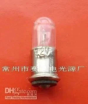 6v 0.75a a104 xenon lamp with metal base on orange background