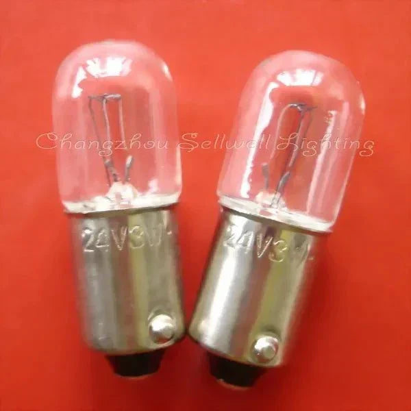 Two miniature 24v 3w Ba9s base lamps on red background