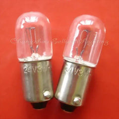 Two miniature 24v 3w Ba9s base lamps on red background