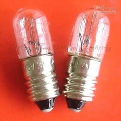 555lampen 3w E10 A593 miniature lighting lamps 110v with clear glass bulbs and metal screw bases on red background