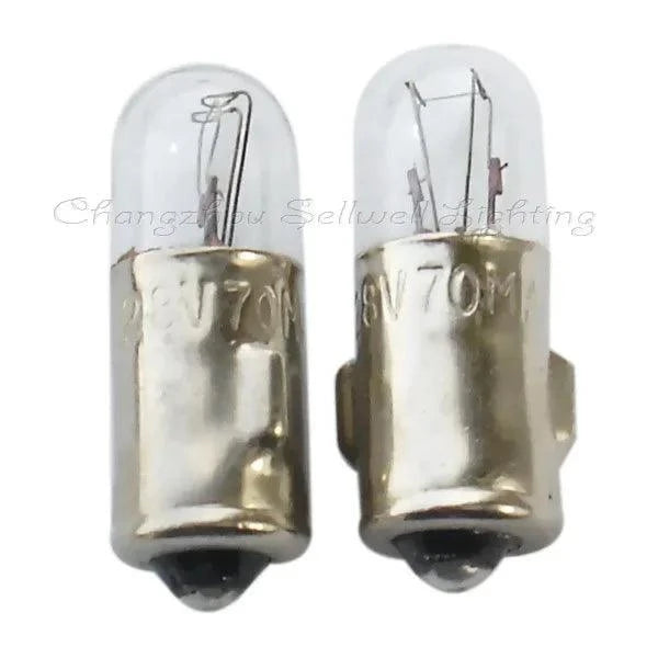 Two miniature 28V 70mA BA7S T7x20 A107 automotive light bulbs