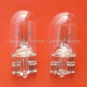 Auto light 12v 5w T10 bulb pair on red background for automotive use