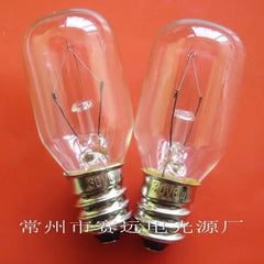 Two miniature 30v 6w E12 base light bulbs on orange background