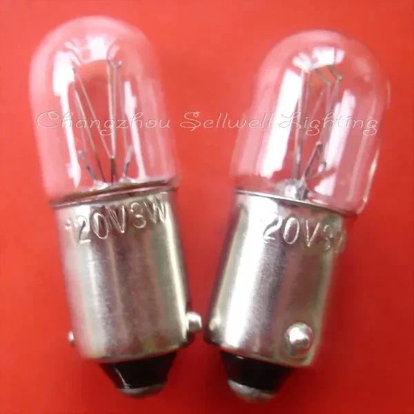 Two miniature 120v 3w Ba9s base incandescent lamps on red background