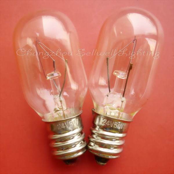 Two clear 24V 5W E12 small screw base instrument indicator light bulbs on a red background