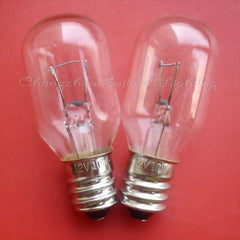 Two clear small E12 lamp holder indicator bulbs with metal screw bases on red background