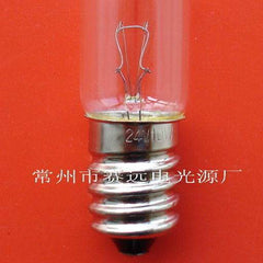 E14 transparent spiral indicator bulb with old screw base on red background