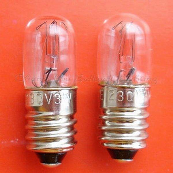 two small clear glass E10 screw base instrument bulbs on orange background for 3V and 230V applications